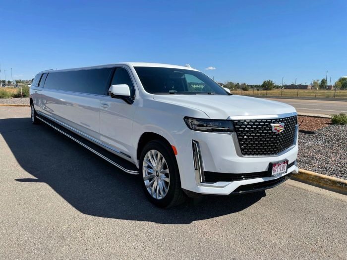 White Escalade stretch limo
